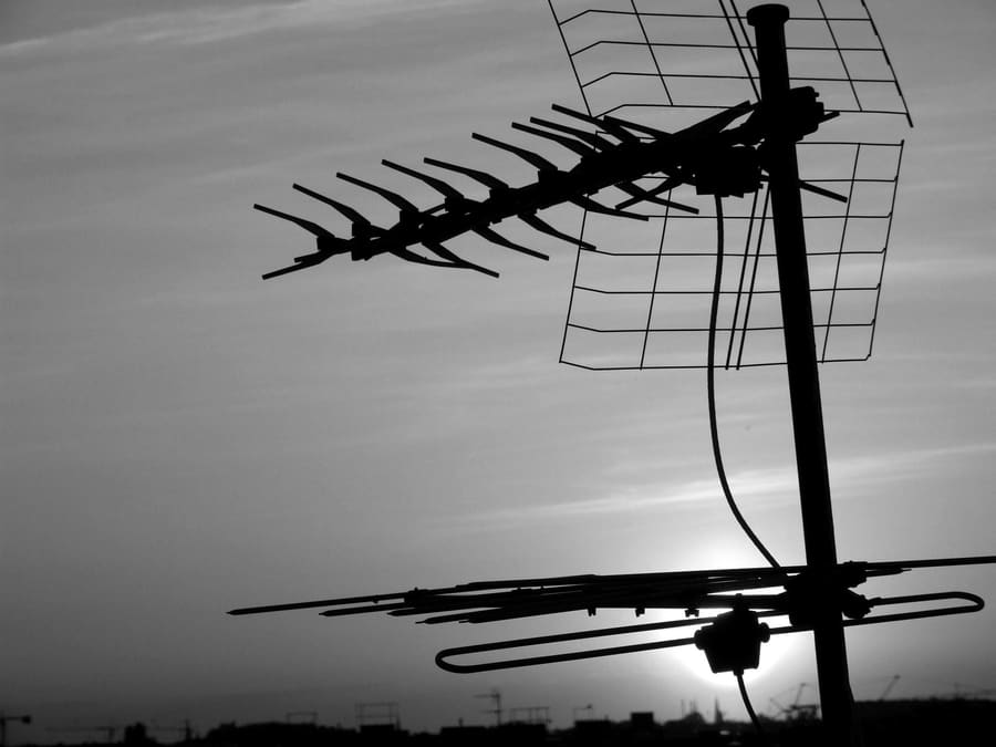 TV aerial silhouetted against the sky